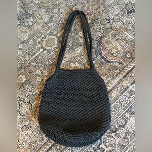 Black woven shoulder bag